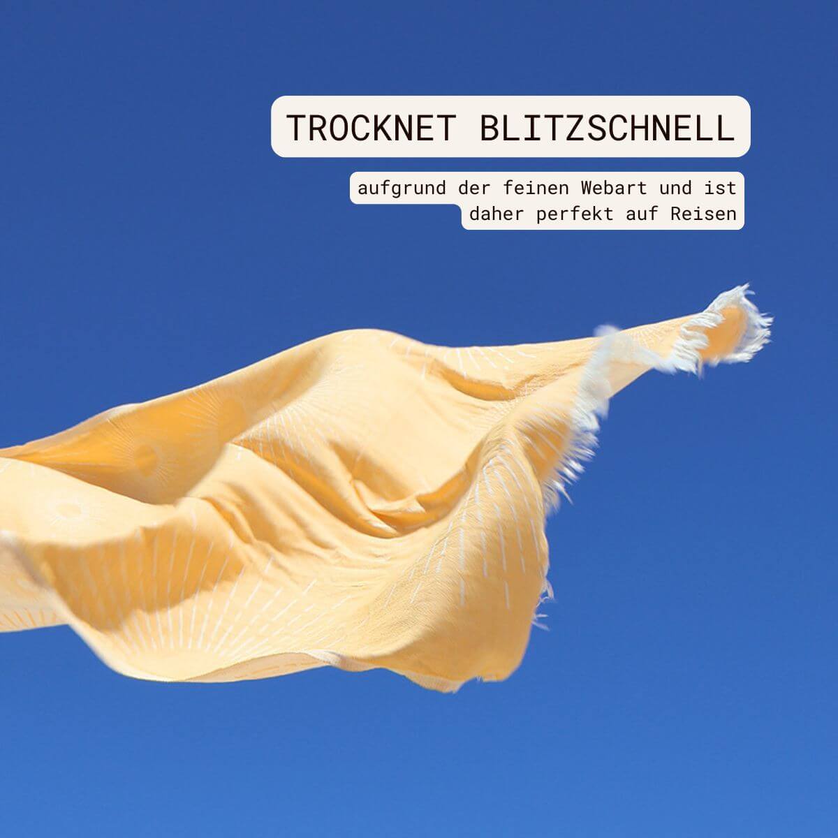 Leichtes Strandtuch (95x170 cm) aus 100% OEKO-TEX zertifizierter Baumwolle für Damen | Strandtuch in der Farbe Gelb mit Sonnenmuster fliegend in der Luft