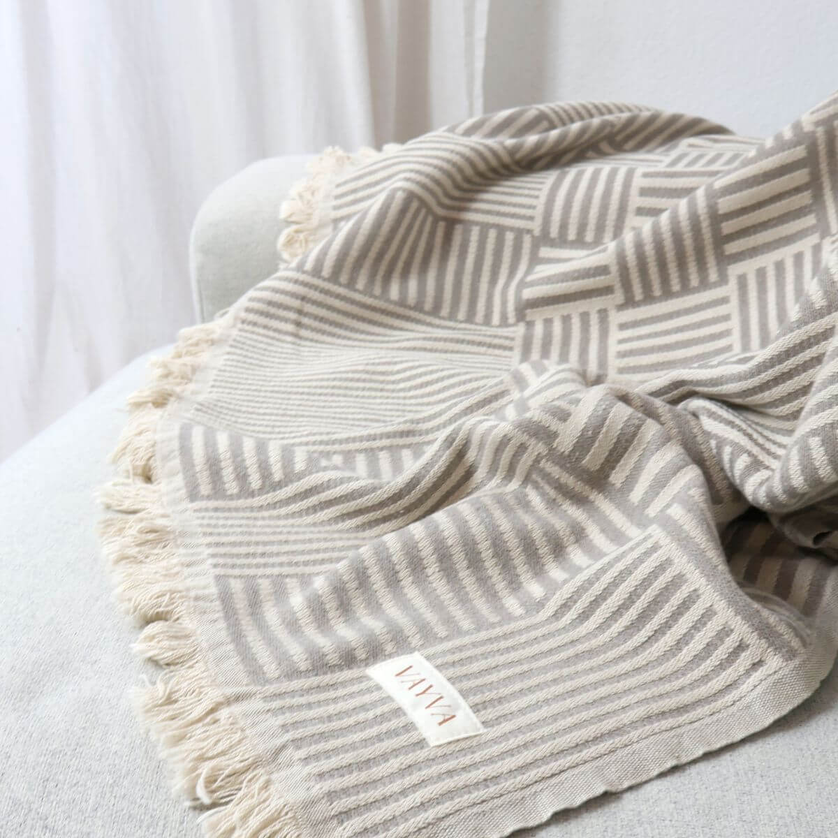 Couchdecke mit recycelter Baumwolle