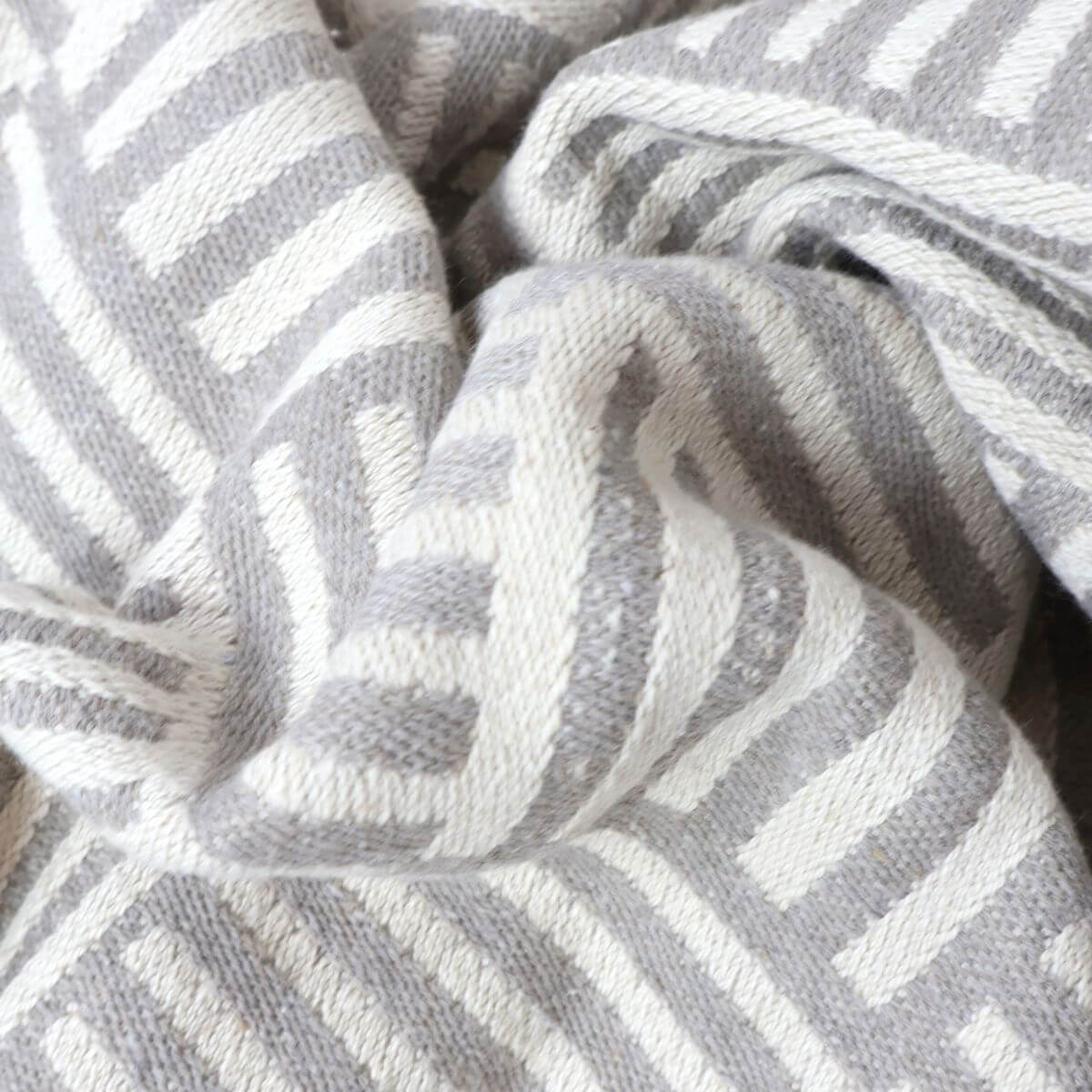 Couchdecke mit recycelter Baumwolle