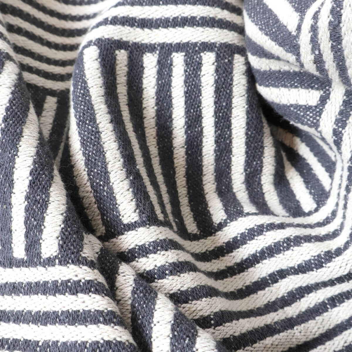 Couchdecke mit recycelter Baumwolle