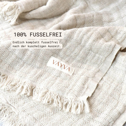 Kuscheldecke (135x200 cm) aus 70% Leinen und 30% OEKO-TEX zertifizierter Baumwolle | Kuscheldecke in der Farbe Beige | Nahaufnahme von Decke